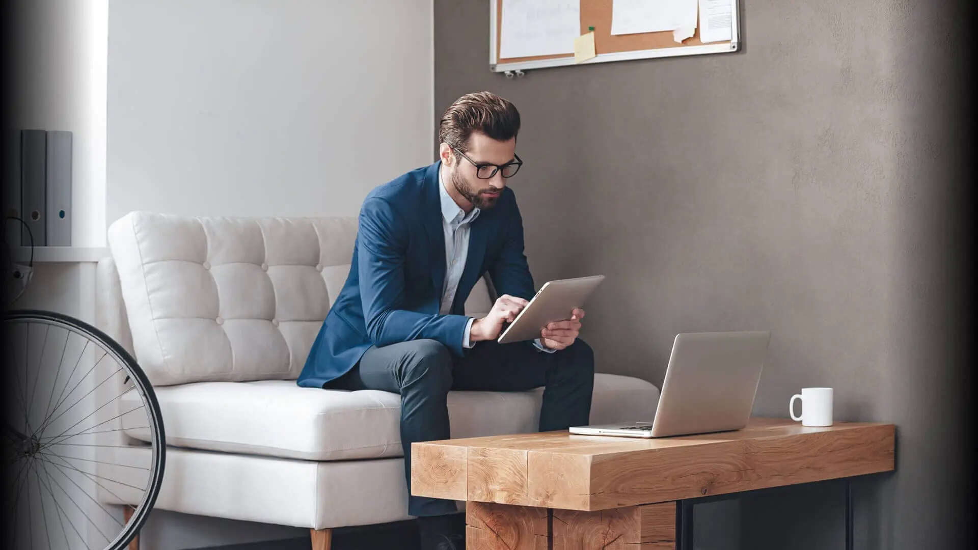 Man on the sofa uses a digital identity device