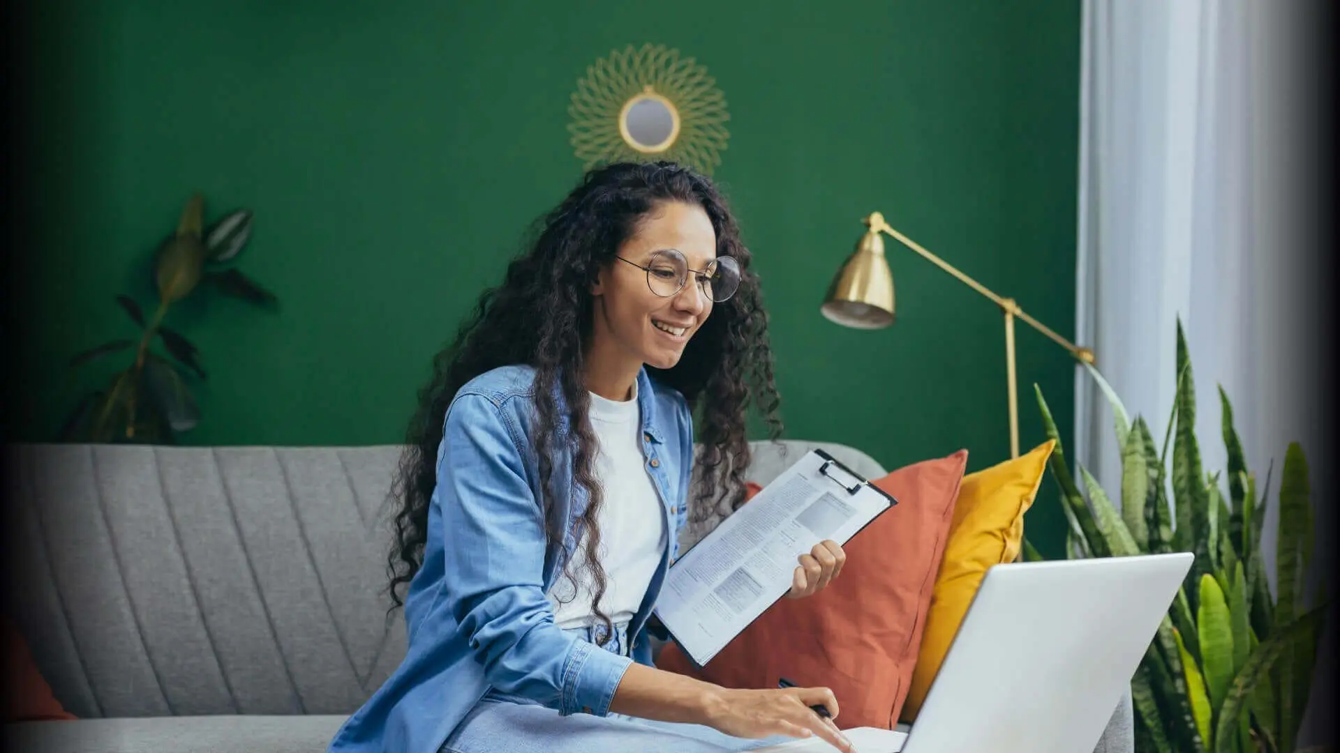 An accountant with a laptop makes an electronic delivery of documents