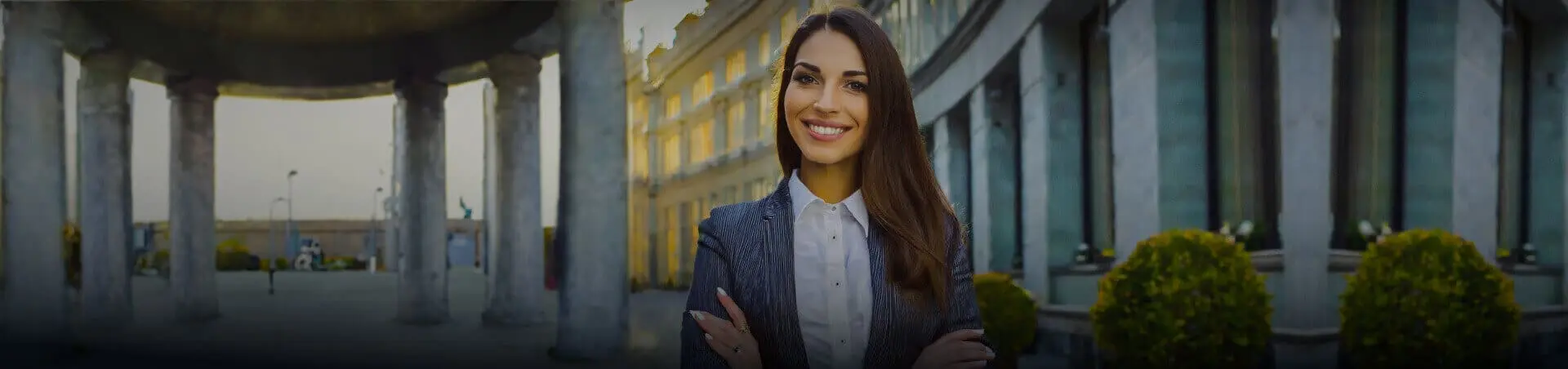 Successful business woman in a city scenery