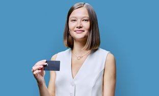 Woman holds a smart card in her hand